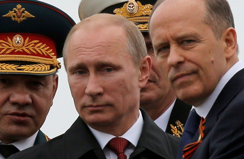 Vladimir Putin and and Russia’s FSB Director Alexander Bortnikov (right)