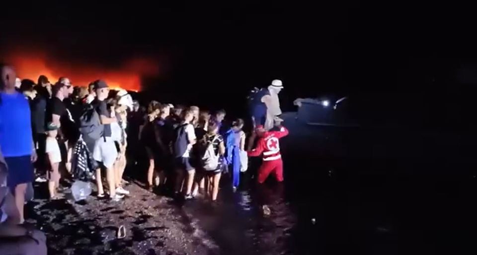 The footage of the beach rescue as hoards of people waited to clamber aboard boats and head to safety