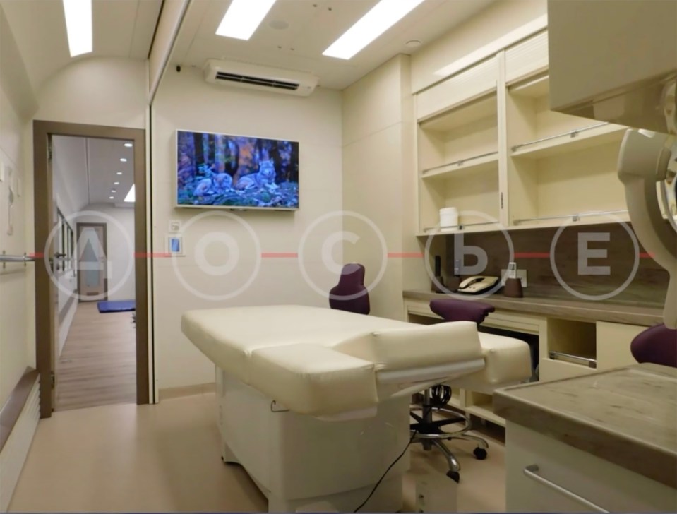 The hospital bed has a flat screen television inside