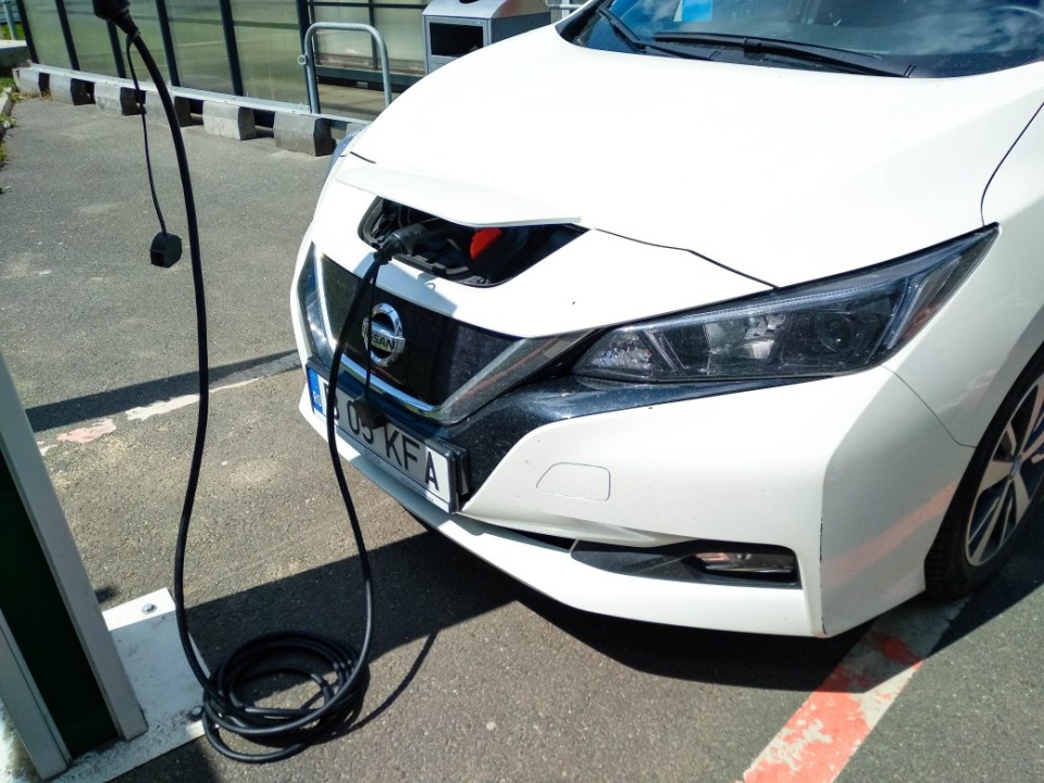 Electric car charging point with Nissan Leaf connected in Bucharest, Romania, 2021