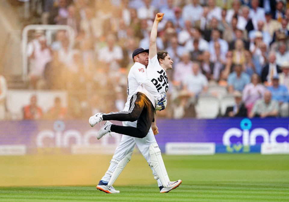 England's Johnny Bairstow was hailed as a hero by PM Rishi Sunak after carrying an eco-activist off the Ashes pitch