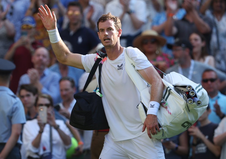 Andy Murray waves goodbye to the crowd after his crushing defeat