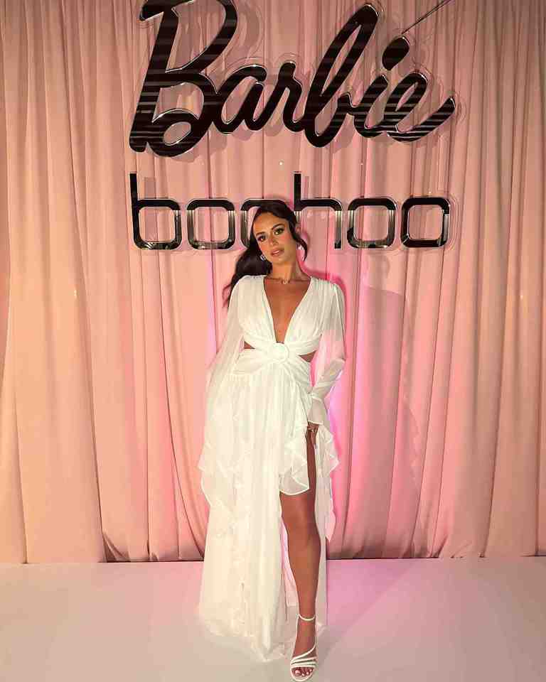 Love Island's Olivia wore a plunging cut out dress to the bash