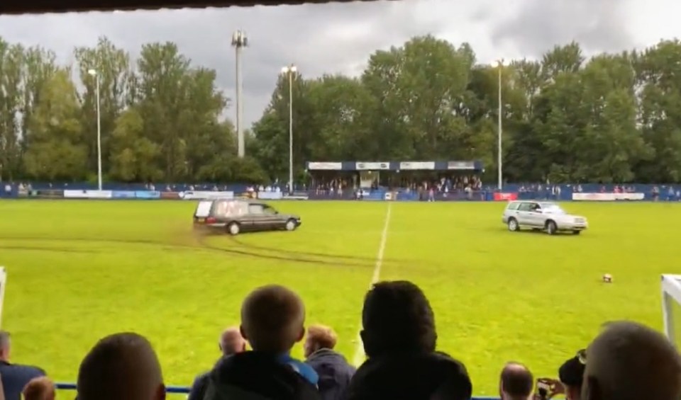 The two vehicles were seen churning up the pitch