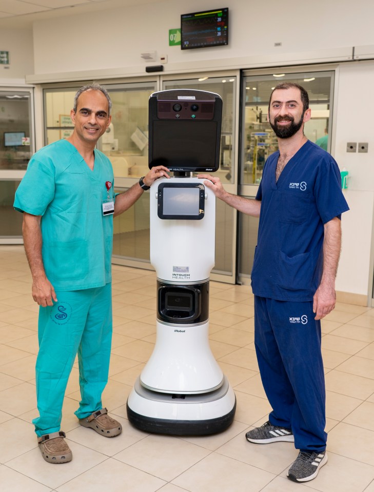 Dr Evyatar, left, told The Sun on Sunday: 'Robots have been important for us since the pandemic when we were scared to touch patients'