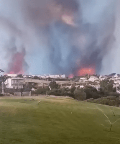 Wildfires are baring down on resort towns as brave firefighters battle the flames