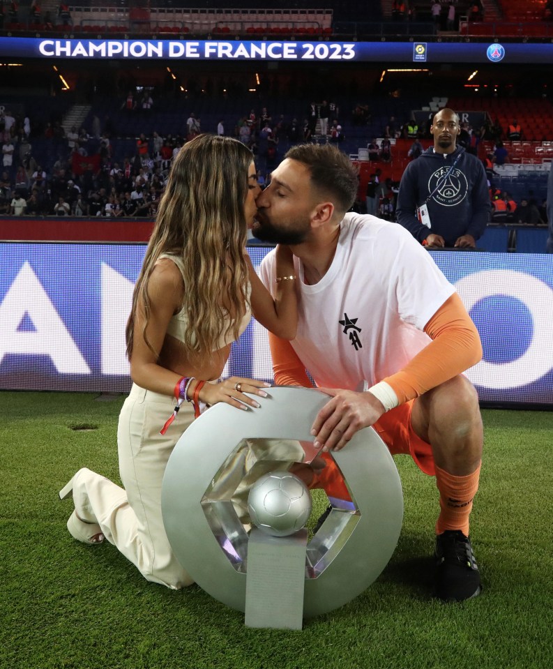 Donnarumma celebrating the championship trophy with his girlfriend, Alessia Elefante, last month