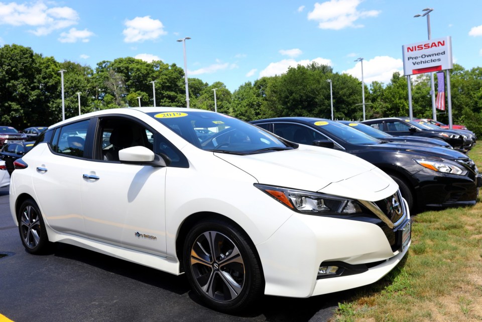 Milford, MA - July 13: This 2019 pre-owned Nissan Leaf SV is the only electric vehicle on the lot, for now. Because of a global chip shortage, car dealerships are having trouble stocking in-demand electric vehicles. Guy Bedau, fleet sales manager of Milford Nissan, said the last brand new 2022 car he sold was three weeks ago. (Photo by Pat Greenhouse/The Boston Globe via Getty Images)