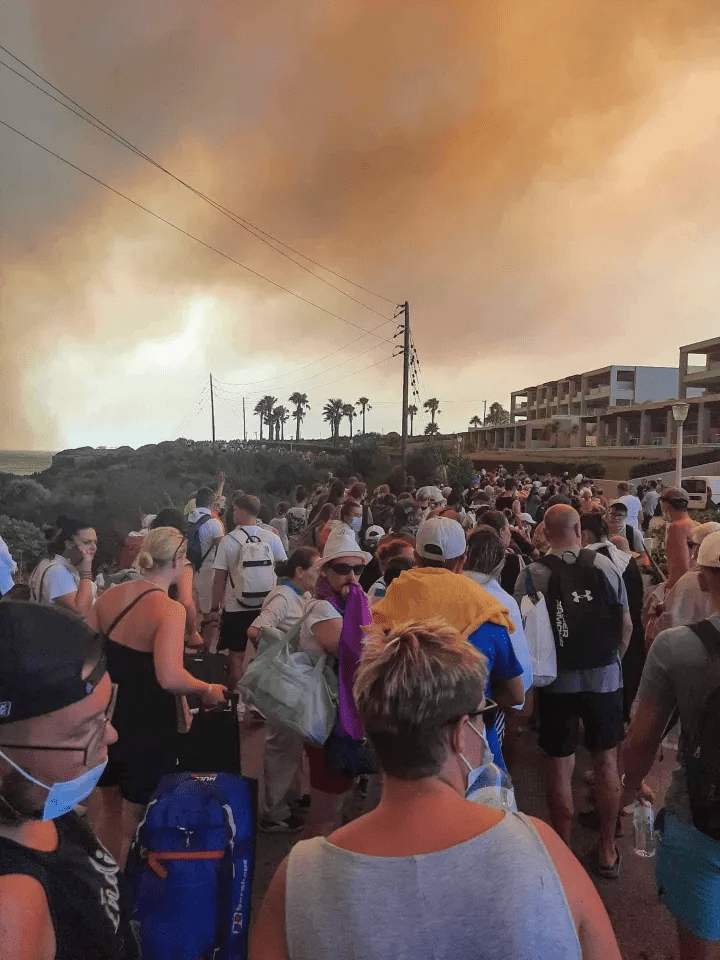 Pictures showed columns of people fleeing villages and resorts on the island of Rhodes