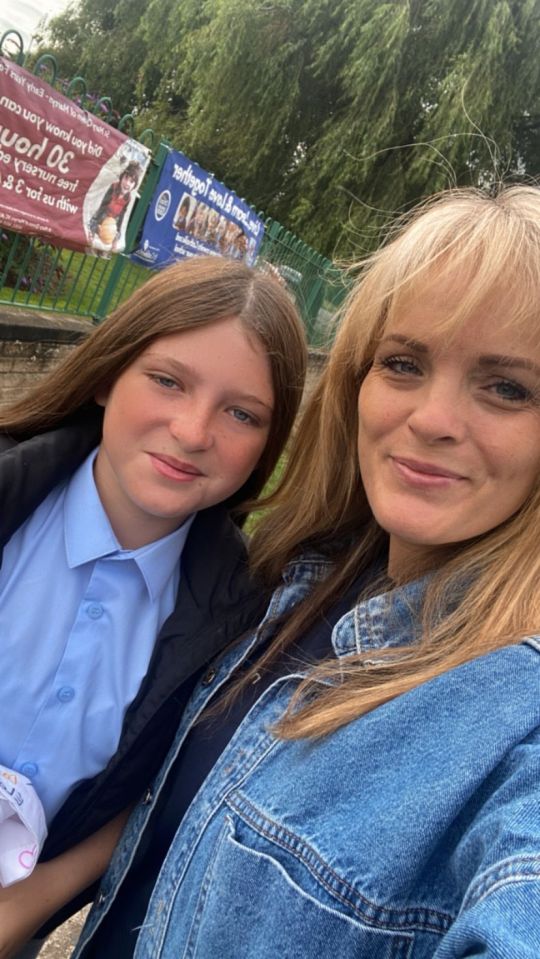 Stanley's sister with mum Jenny Dees as she gets ready to graduate from primary school