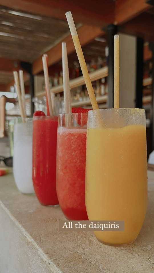 She captured their rainbow-coloured cocktails at the beach bar