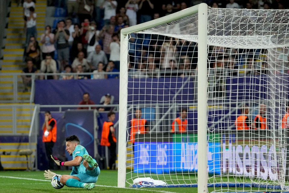 James Trafford saved a stoppage-time penalty to clinch victory for England