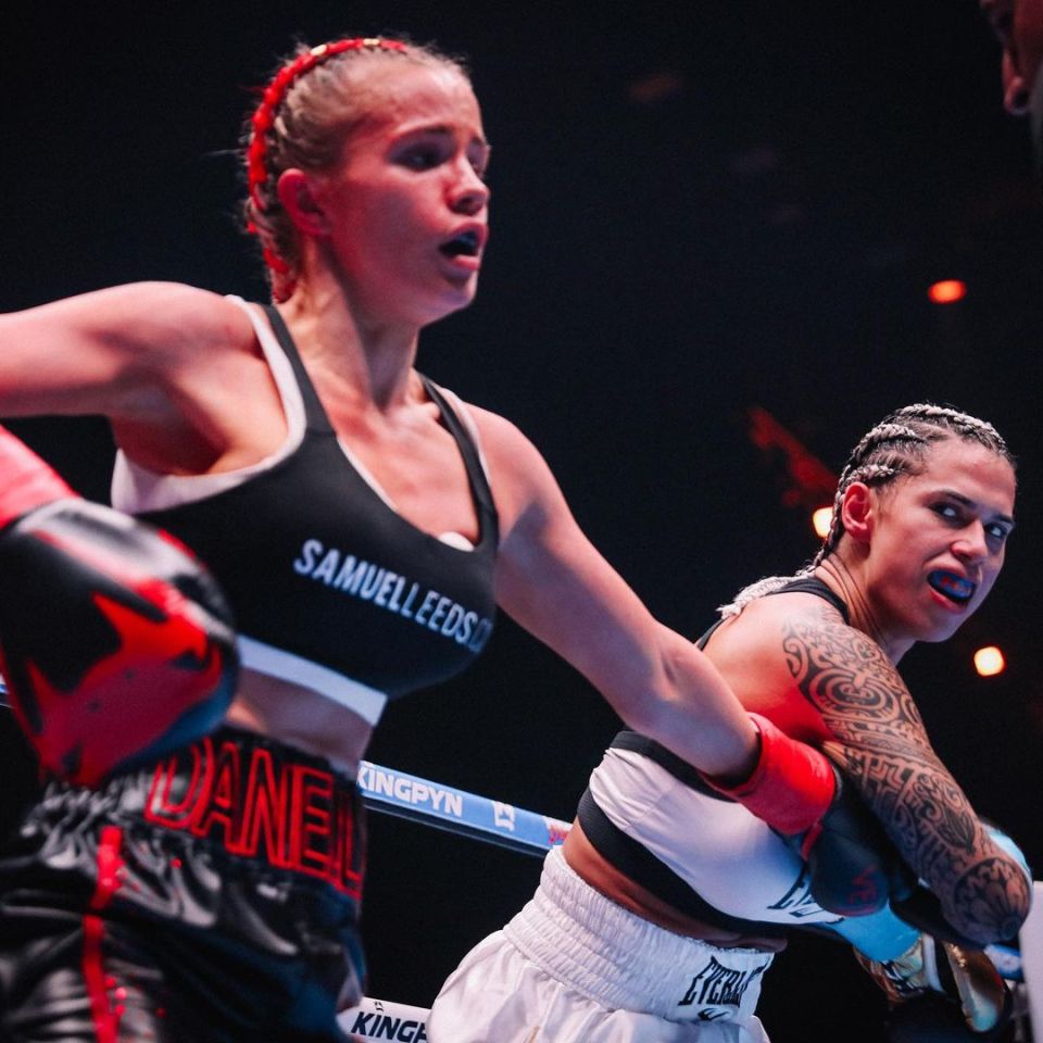 Jully Poca, right, takes on Brooke in her second boxing bout