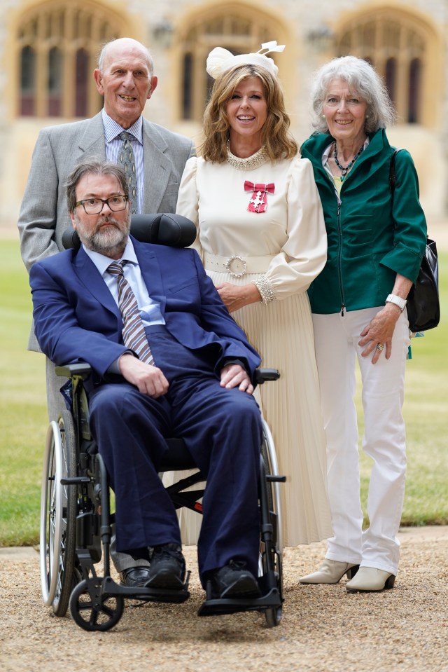 Kate Garraway with her family as she was awarded her MBE