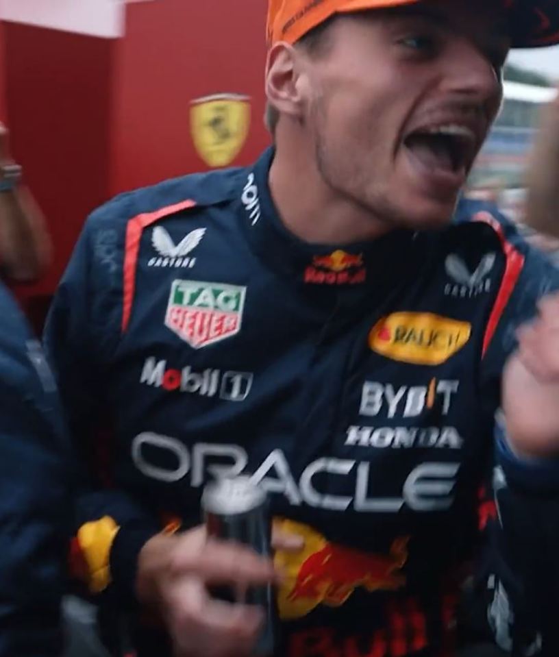 As champagne bottles were popped, Verstappen saw his trophy damaged