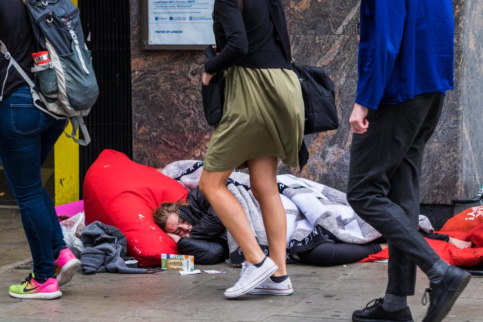 A rough sleeper near the skyscrapers of Aldgate