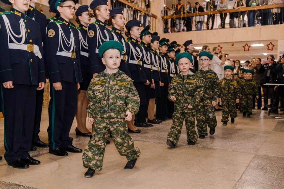 Innocents up to the age of seven are already 'role playing' battle scenarios with boys in military uniforms