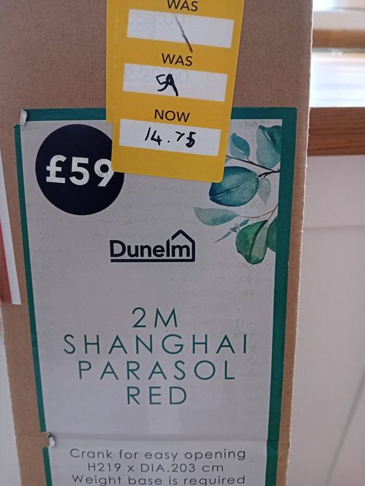 The '2m Shanghai Parasol' in red has been reduced to just £14.75