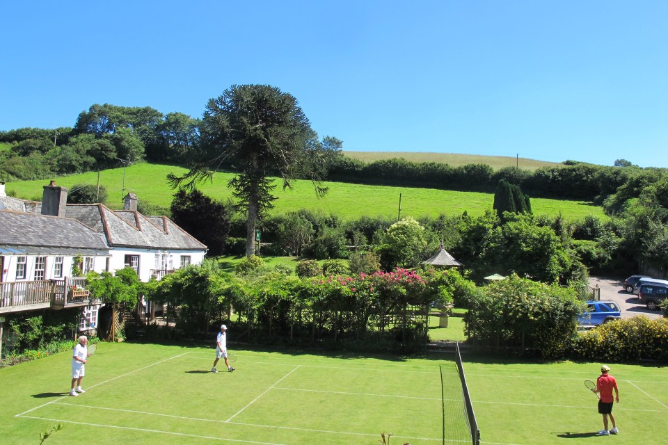 For a full Wimbledon experience, take to the grass tennis court at the charming self-catering cottage complex near the waterside village of Dittisham in South Devon