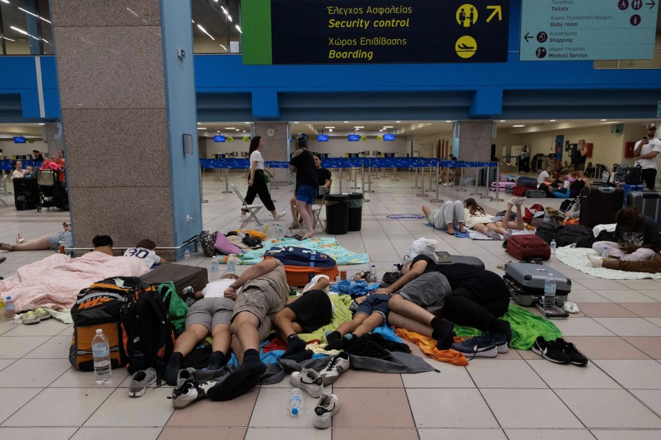 Evacuated tourists, including children, are being forced to sleep on the airport floor