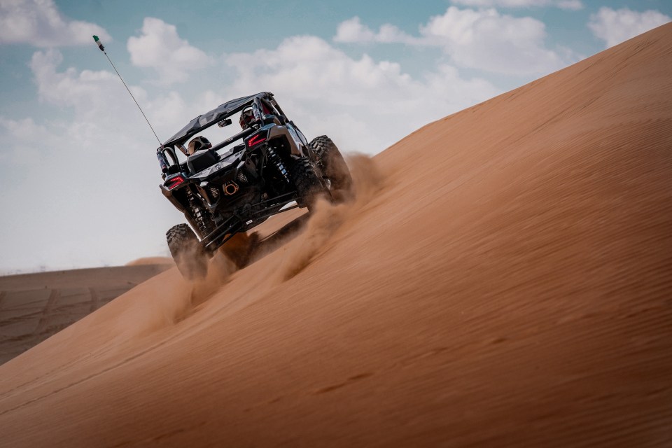 You'll even get to go "dune bashing" across the desert