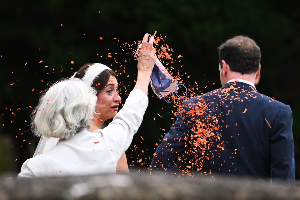 George Osborne and new wife Thea Rogers were covered in orange confetti by an eco-loon