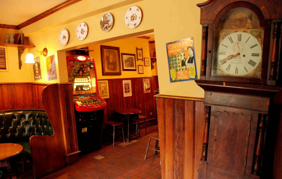 A view inside the bar showing the 'missing' grandfather clock