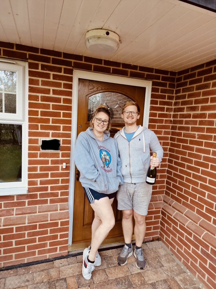 Gemma and Josh outside their new home