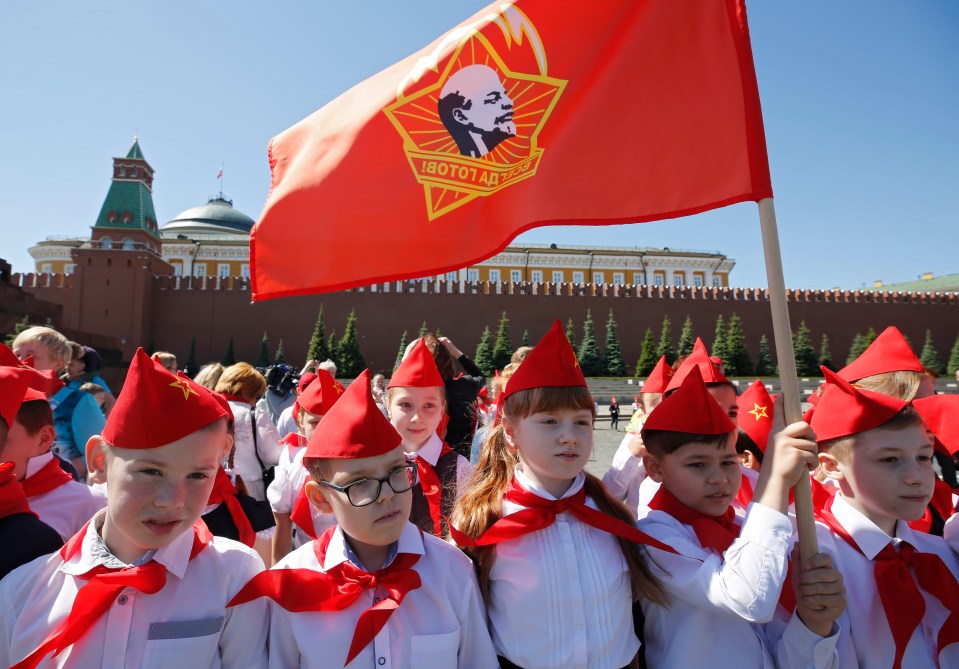 Children as young as five are being trained to mindlessly follow their leader like the days of the Soviet Union