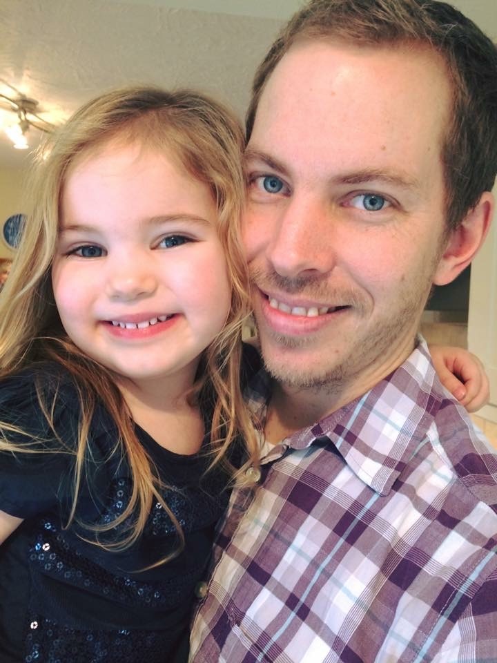 Little Emily smiling with dad Andy