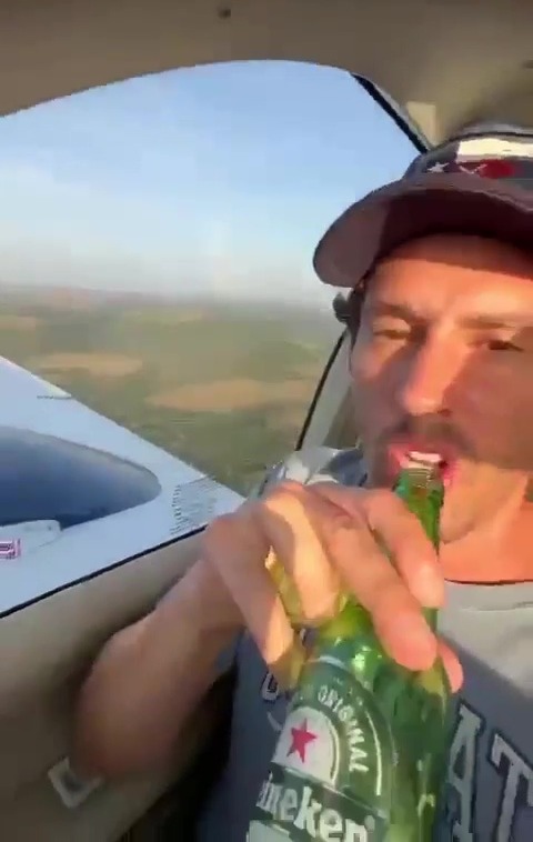 Garon Maia videoed himself swigging a beer while his son flew his plane