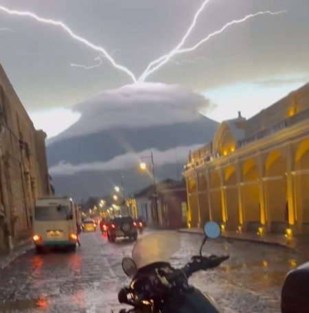 The lightning bolts looked like they were coming from the volcano's peaks