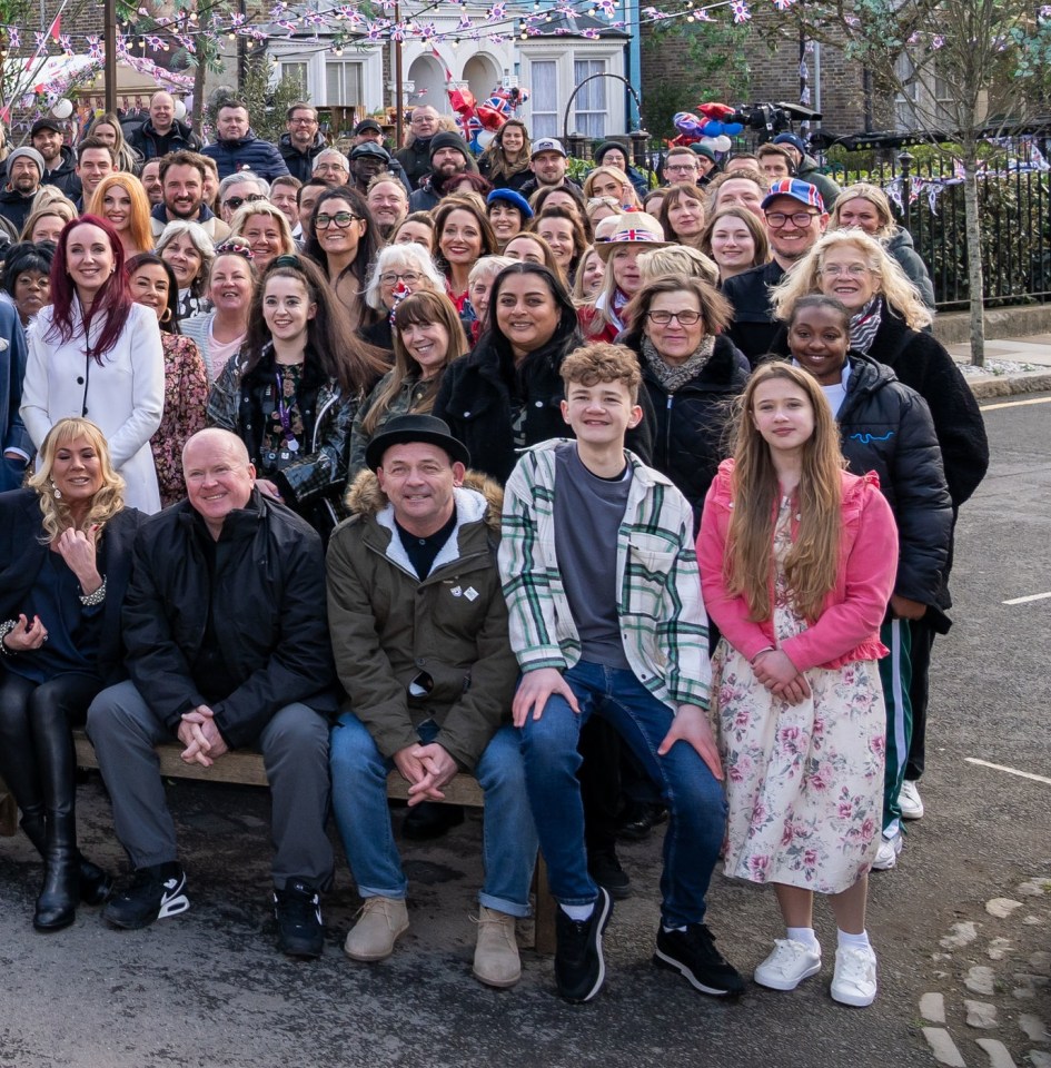 The cast and crew of EastEnders pose for a group picture