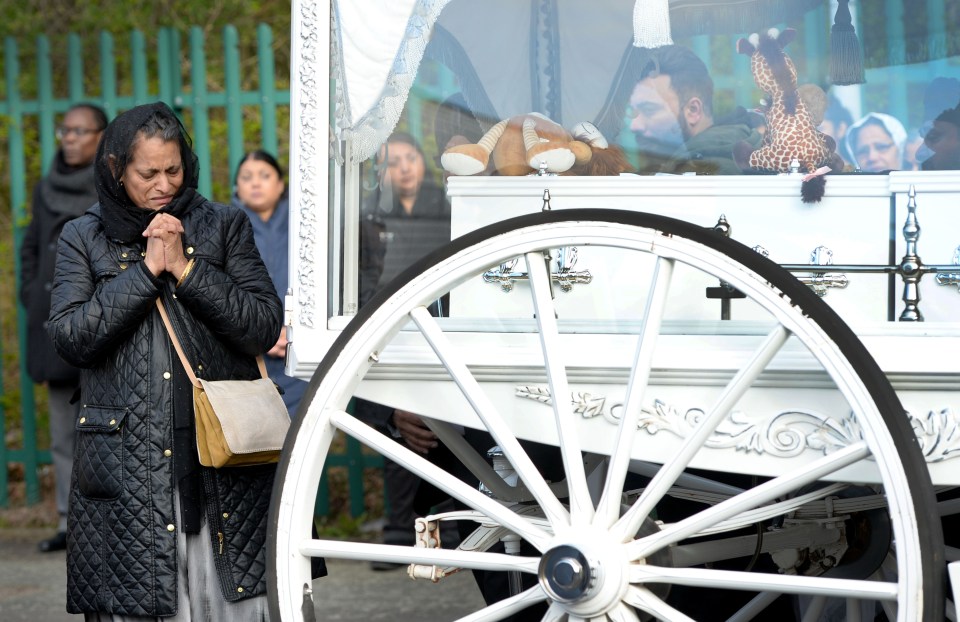 Hundreds of mourners turned out for the boys' funeral