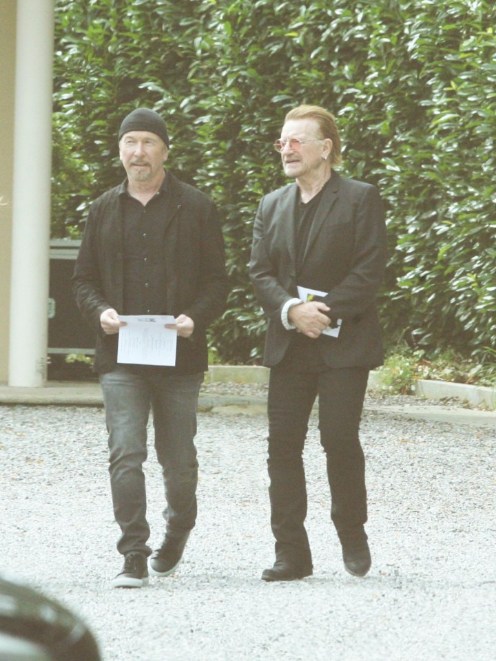 Bono and Edge attended the singer's private service today