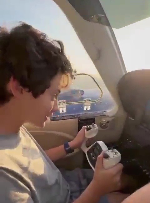 Francisco, 11, is seen piloting the aircraft