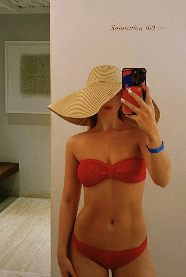 Maisie Smith flaunted her washboard abs in a revealing red bikini