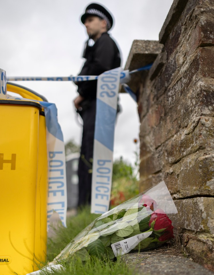 Flowers have been laid outside the house in memory of the little girl