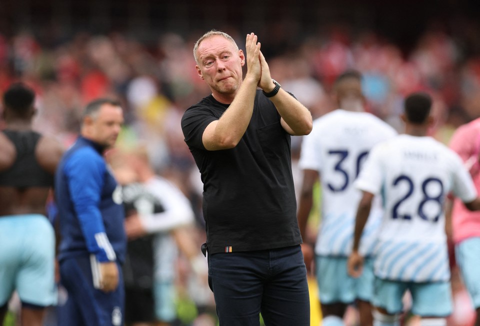 Soccer Football - Premier League - Arsenal v Nottingham Forest - Emirates Stadium, London, Britain - August 12, 2023 Nottingham Forest manager Steve Cooper applauds fans after the match REUTERS/David Klein EDITORIAL USE ONLY. No use with unauthorized audio, video, data, fixture lists, club/league logos or 'live' services. Online in-match use limited to 75 images, no video emulation. No use in betting, games or single club /league/player publications. Please contact your account representative for further details.