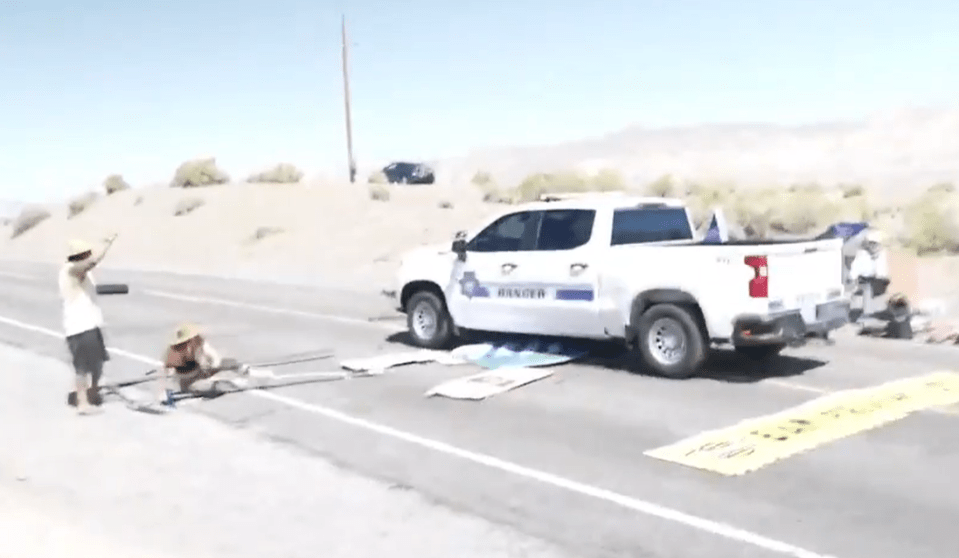 US cops in Nevada are seen driving through a barricade erected by eco yobs