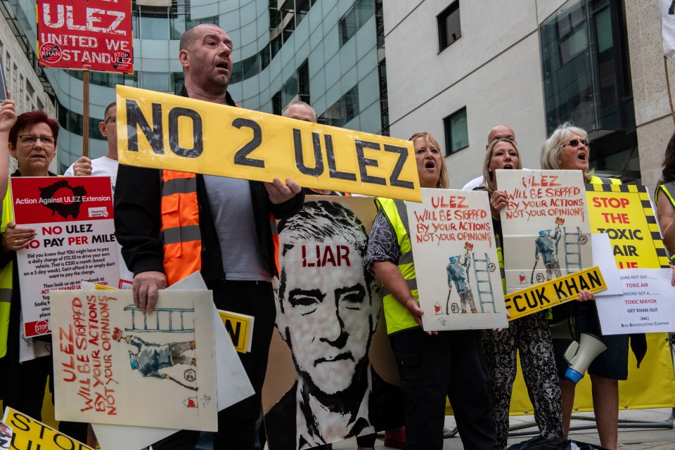 LONDON, ENGLAND - JULY 22: Protesters opposed to the expansion of London's Ultra Low Emissions Zone demonstrate outside BBC Broadcasting House on July 22, 2023 in London, England. The expansion of London Mayor Sadiq Khan's Ultra Low Emission Zone (ULEZ) scheme, due to be in operation by the end of August 2023, is facing legal opposition from outer London boroughs with the results of a Judicial Review due by the end of July. (Photo by Chris J Ratcliffe/Getty Images)