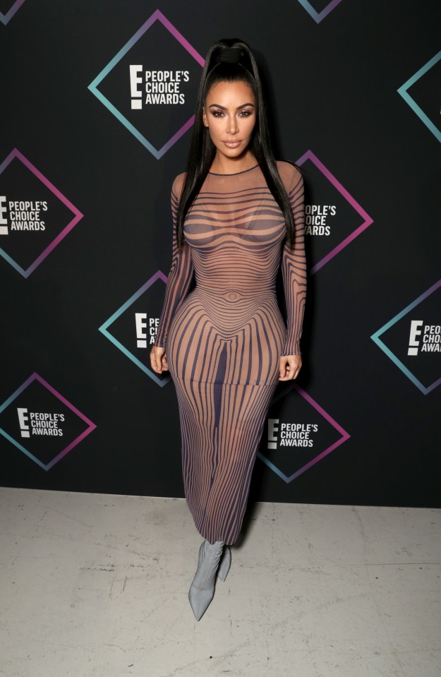 Kim was sure to draw glances in this optical illusion dress