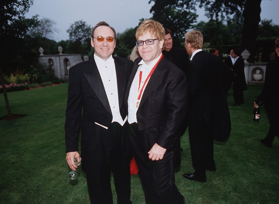 WINDSOR, ENGLAND - JULY 5: Actor Kevin Spacey (L) and singer Sir Elton John at the White Tie and Tiara Ball held at Sir Elton John's Windsor mansion, England on July 5, 2001. The gala, compered by Spacey, raised ?1 million for AIDS research. (Photo by John Rogers/Getty Images)