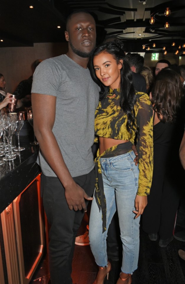 LONDON, ENGLAND - DECEMBER 09: Stormzy (L) and Maya Jama attend Idris Elba's Christmas Party at Kadie's Cocktail Bar & Club on December 9, 2017 in London, England. (Photo by David M. Benett/Dave Benett/Getty Images)