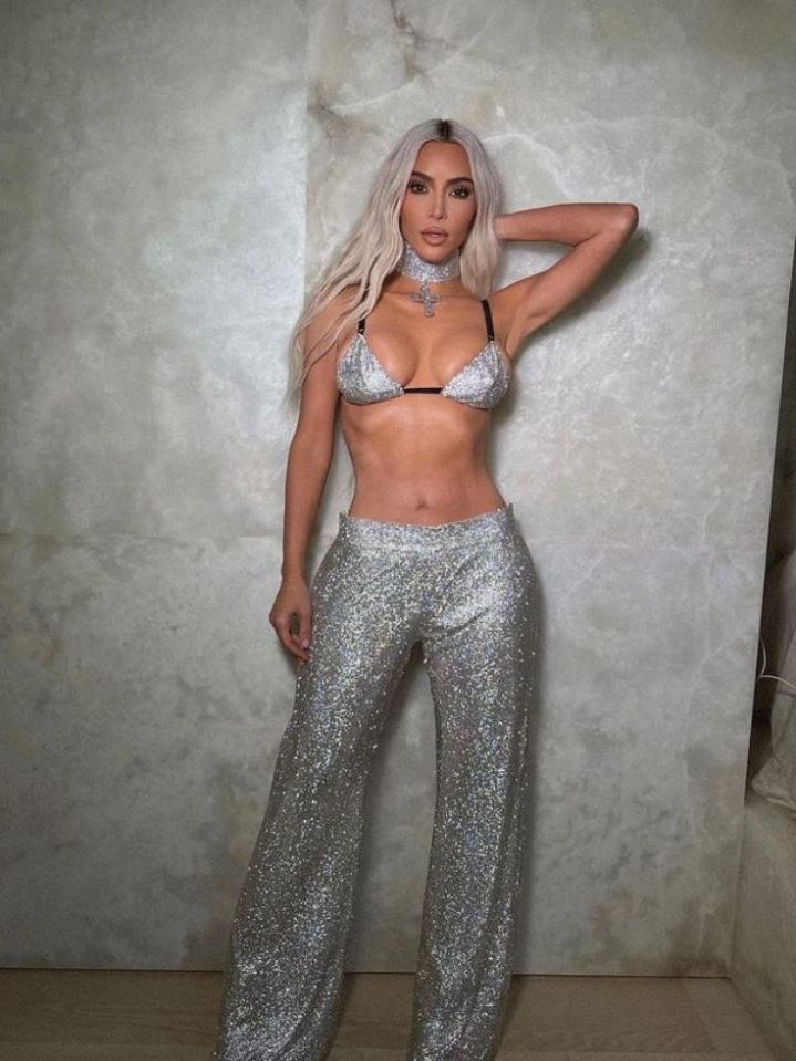 Kim wore this sparkly choker with her dazzling bikini top