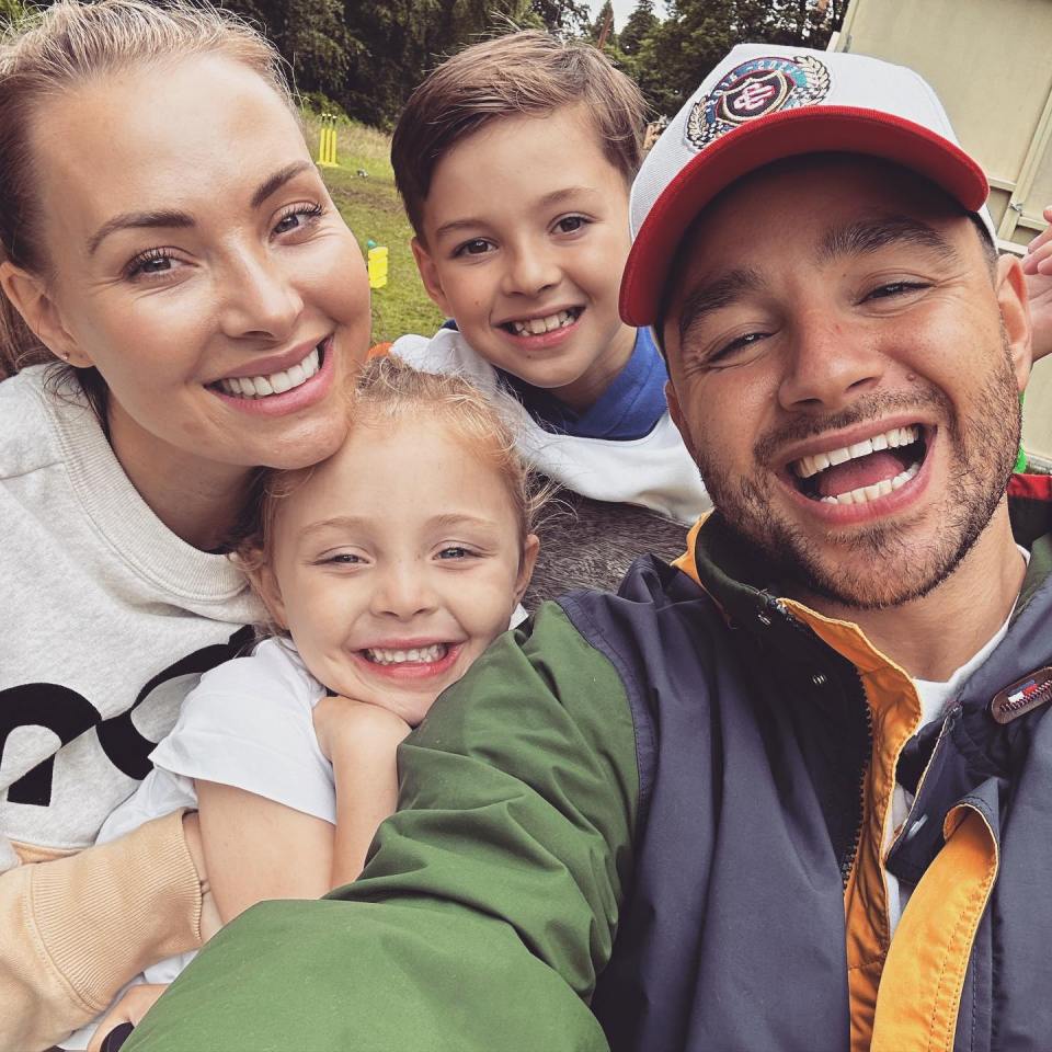 Adam with wife Caroline and their two children