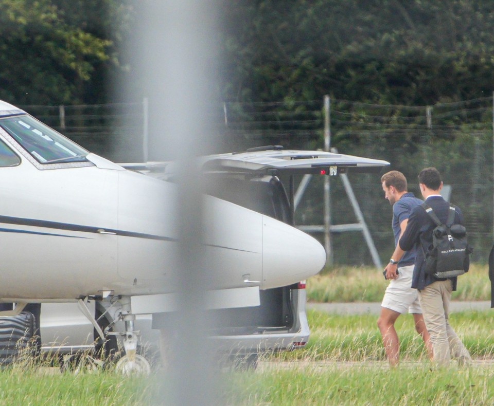 Kane boards his flight from Stansted to Germany