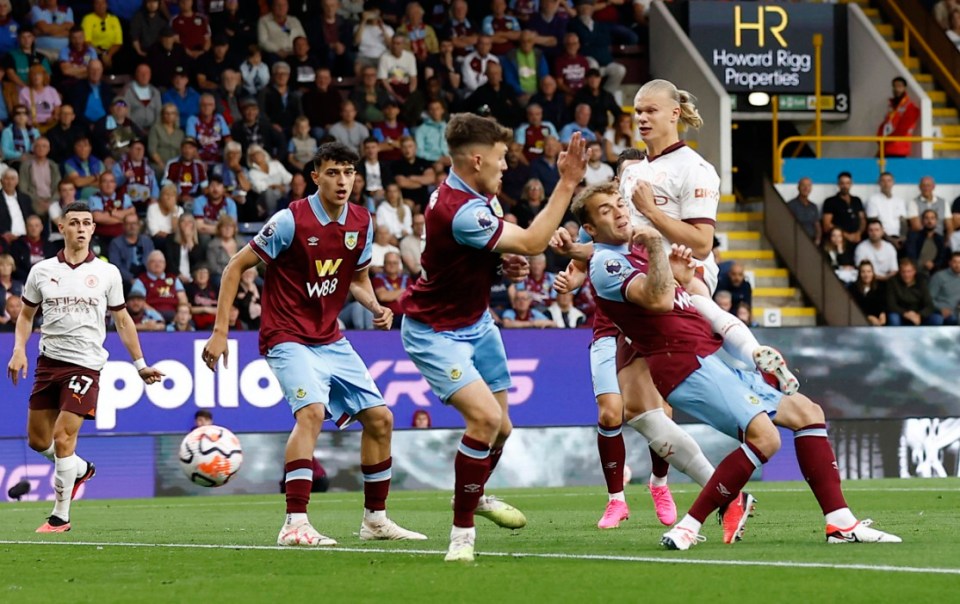 Soccer Football - Premier League - Burnley v Manchester City - Turf Moor, Burnley, Britain - August 11, 2023 Manchester City's Erling Braut Haaland scores their first goal Action Images via Reuters/Jason Cairnduff EDITORIAL USE ONLY. No use with unauthorized audio, video, data, fixture lists, club/league logos or 'live' services. Online in-match use limited to 75 images, no video emulation. No use in betting, games or single club /league/player publications. Please contact your account representative for further details.