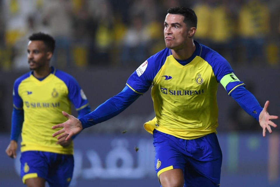 Nassr's Portuguese forward Cristiano Ronaldo celebrates scoring his team's first goal during the Saudi Pro League football match between Al-Nassr and Al-Raed at the al-Awwal Park Stadium in the Saudi capital Riyadh on April 28, 2023. (Photo by AFP) (Photo by -/AFP via Getty Images)