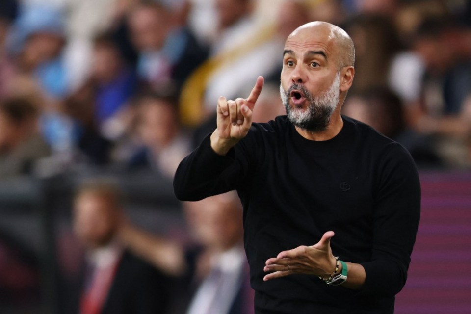 Manchester City's Spanish manager Pep Guardiola reacts during the English Premier League football match between Burnley and Manchester City at Turf Moor in Burnley, north-west England on August 11, 2023. (Photo by Darren Staples / AFP) / RESTRICTED TO EDITORIAL USE. No use with unauthorized audio, video, data, fixture lists, club/league logos or 'live' services. Online in-match use limited to 120 images. An additional 40 images may be used in extra time. No video emulation. Social media in-match use limited to 120 images. An additional 40 images may be used in extra time. No use in betting publications, games or single club/league/player publications. / (Photo by DARREN STAPLES/AFP via Getty Images)